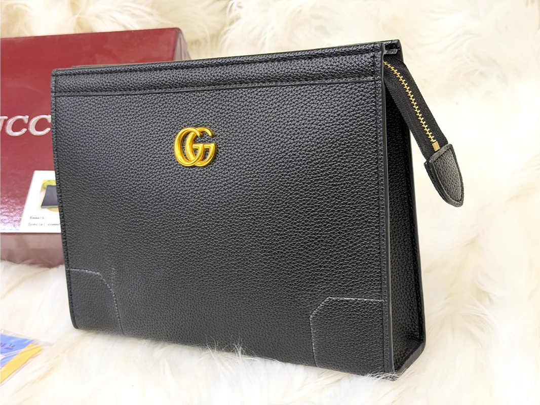 Gucci Premium Black Hand Carry Pouch with Gold GG Logo