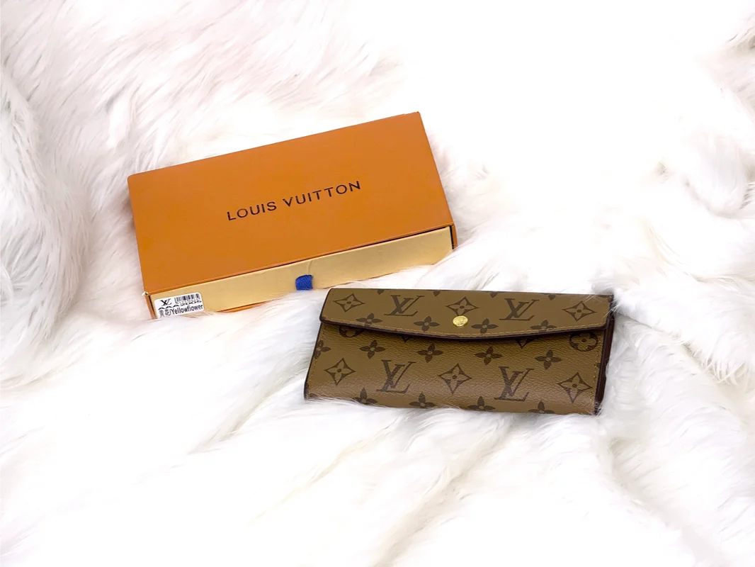 Louis Vuitton Sarah Wallet in Monogram Canvas