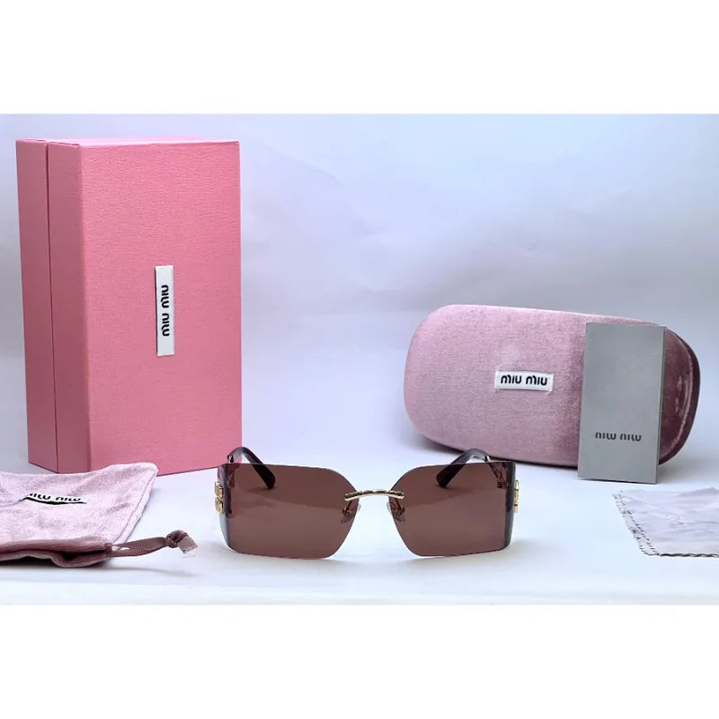 Miu Miu Rimless Sunglasses