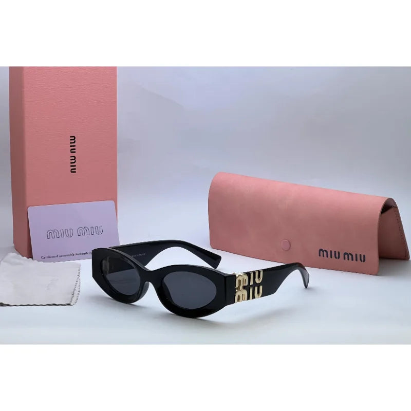 Miu Miu Black Gold Sunglasses