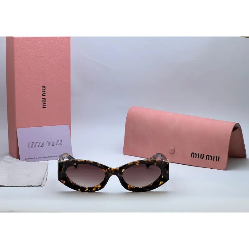 Miu Miu Sunglasses - Brown