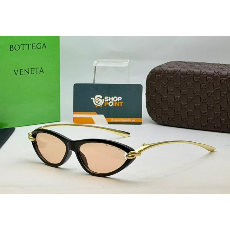 Bottega Veneta Noir Cat Eye Sunglasses for women with elegant cat eye frame and warm tinted lenses 