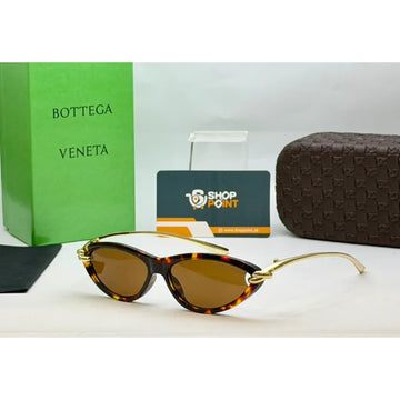 Bottega Veneta Tortoise Cat Eye Sunglasses for women with brown tinted lenses and gold temples
