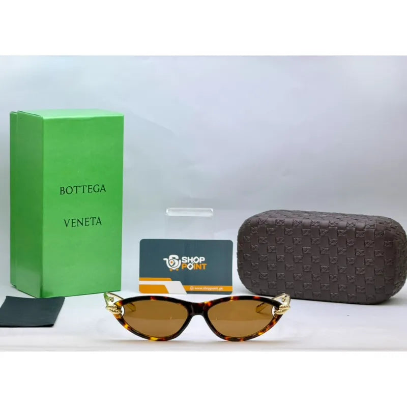 Bottega Veneta Tortoise Cat Eye Sunglasses for women with brown tinted lenses and gold temples