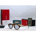 Prada Havana Round Sunglasses with Iconic Metal Plaque for women featuring smoke grey lenses